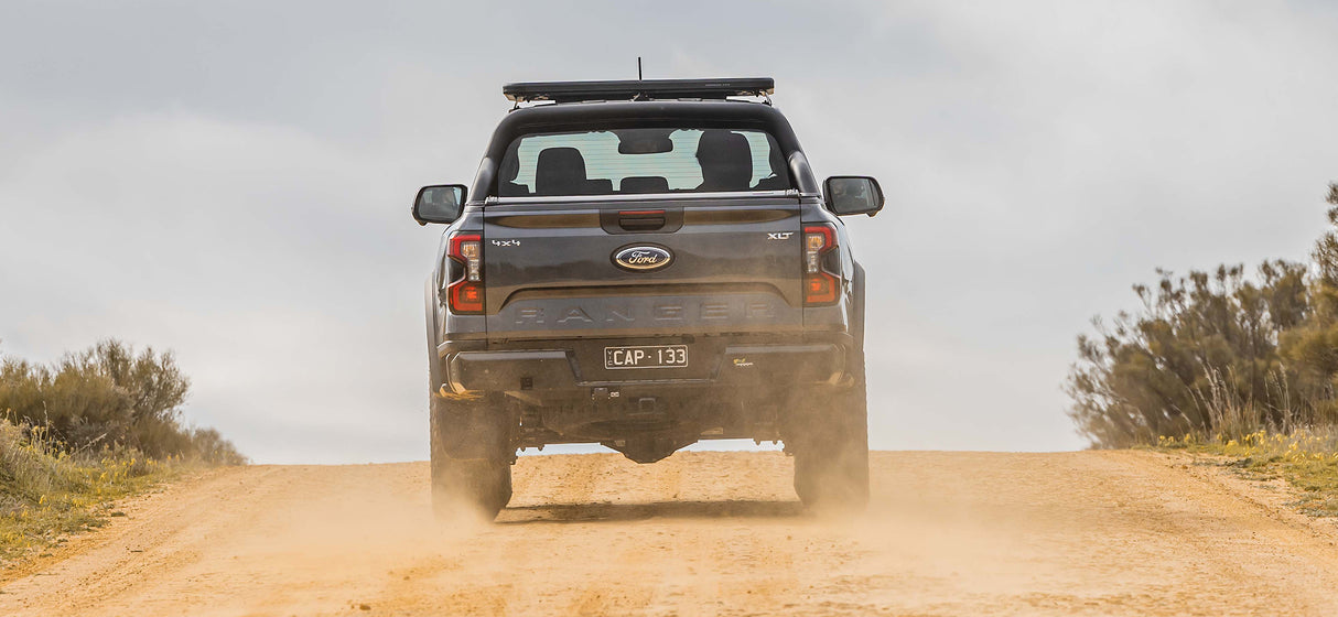 Off-road Ford Ranger Next-Gen with on dirt road.